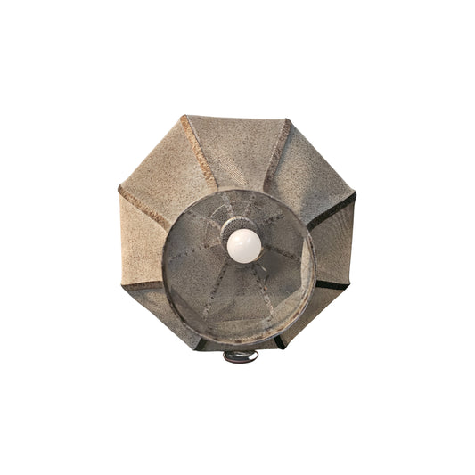 Bottom view of a large Moroccan metal mesh pendant lamp on a white background