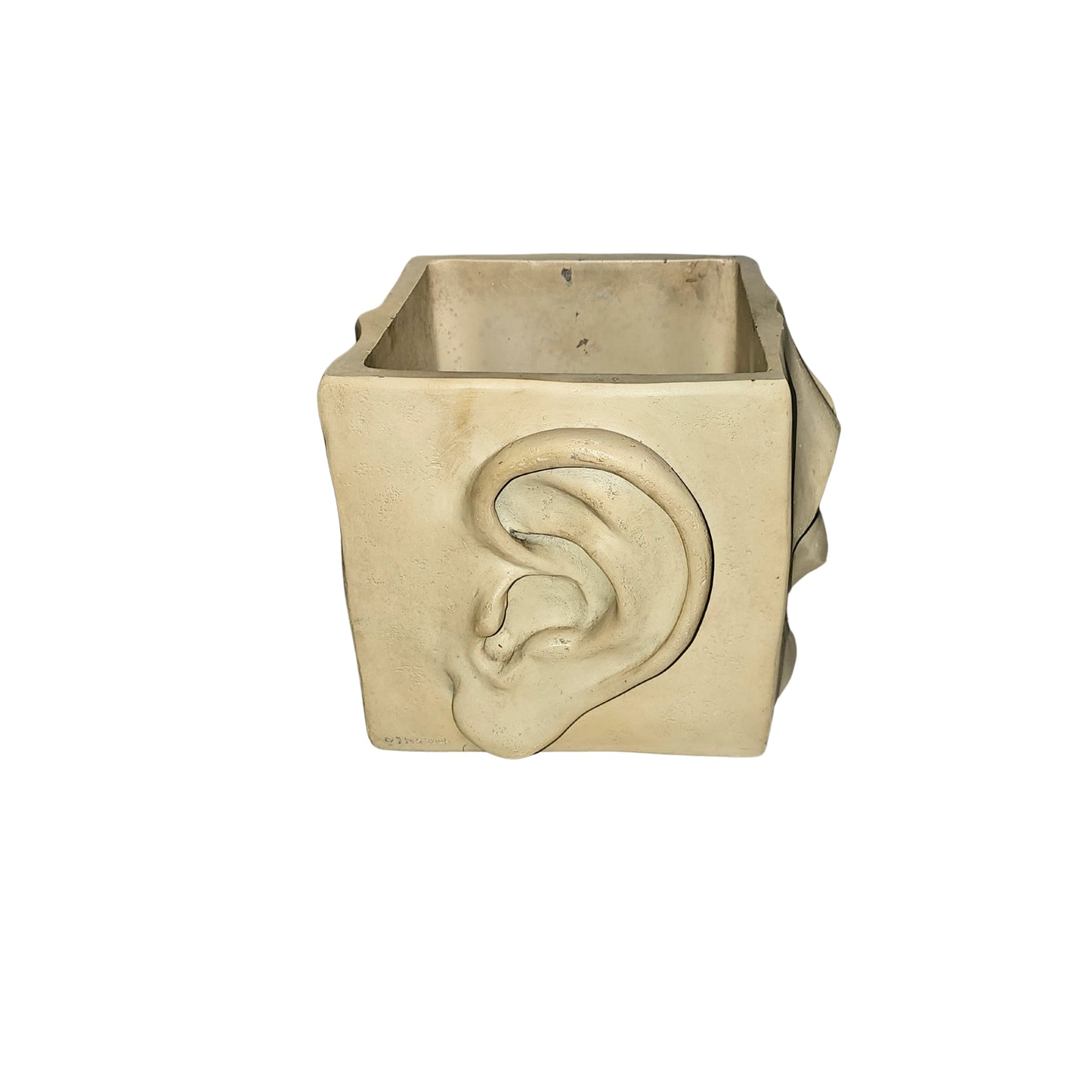 A funky, retro vase with square-faced charm! Made of ceramic, this planter adds personality to any garden.