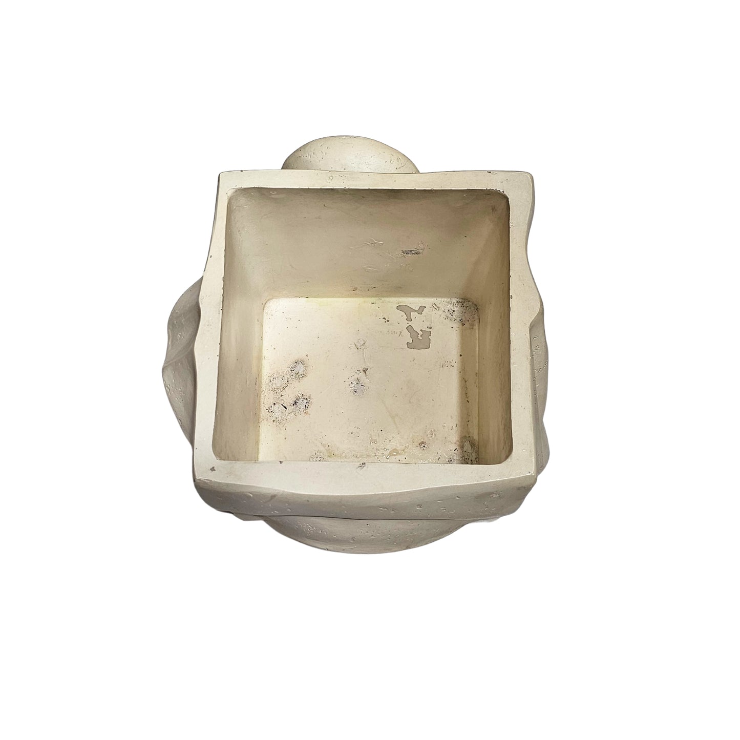 A funky, retro vase with square-faced charm! Made of ceramic, this planter adds personality to any garden.