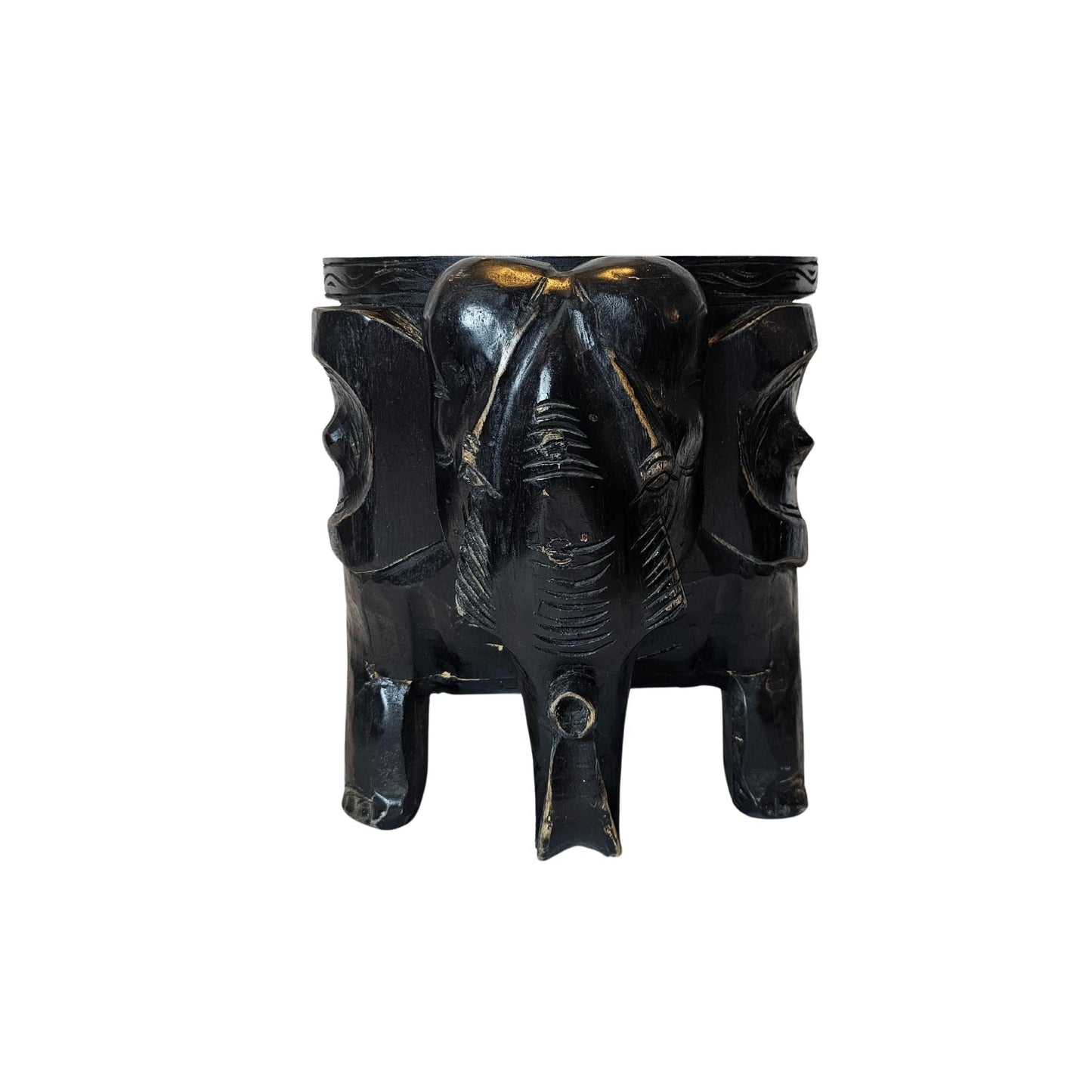 Quirky and fun, this stool features intricate hand-carved details and is stained a deep black.