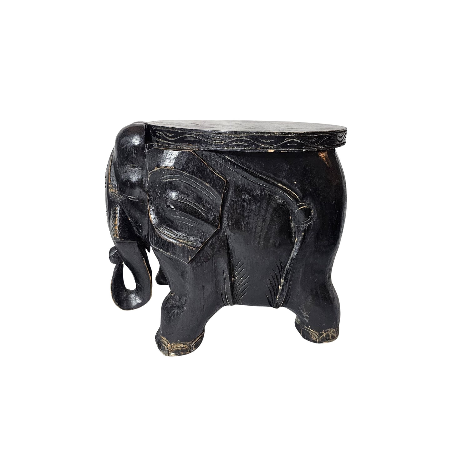 Quirky and fun, this stool features intricate hand-carved details and is stained a deep black.