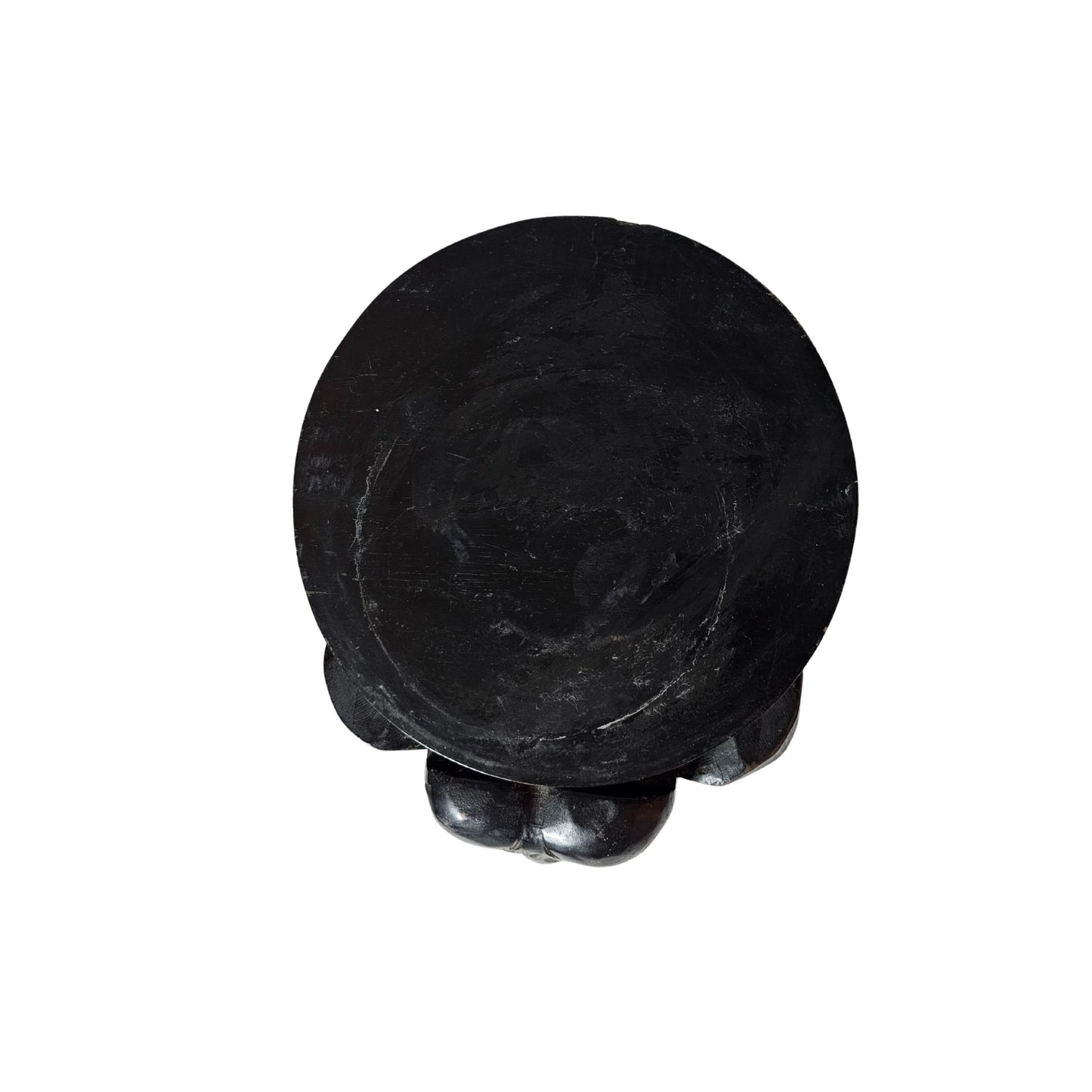 Quirky and fun, this stool features intricate hand-carved details and is stained a deep black.