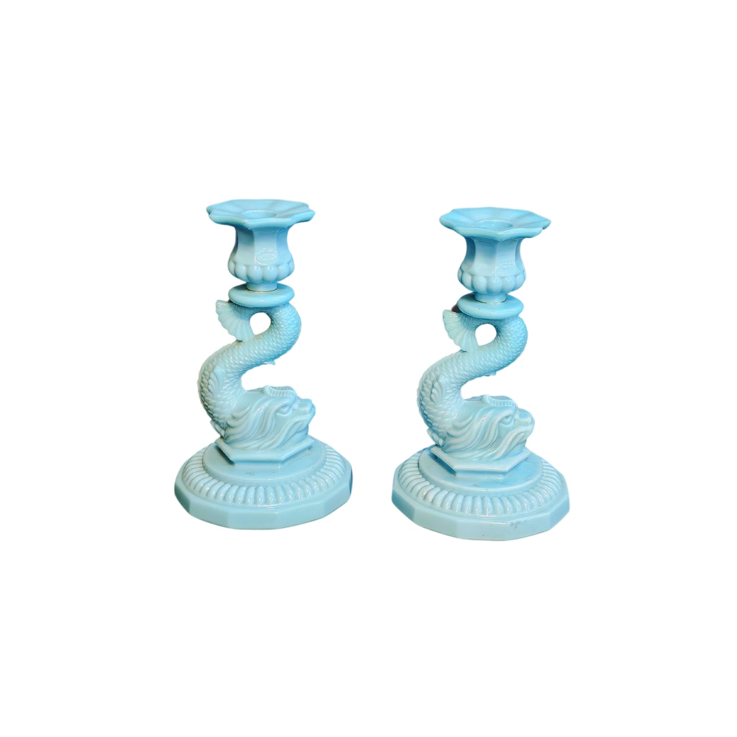 Get these groovy milk-colored candle holders in a set of two for only fifty bucks each! They'll add some serious retro vibes to your home decor.
