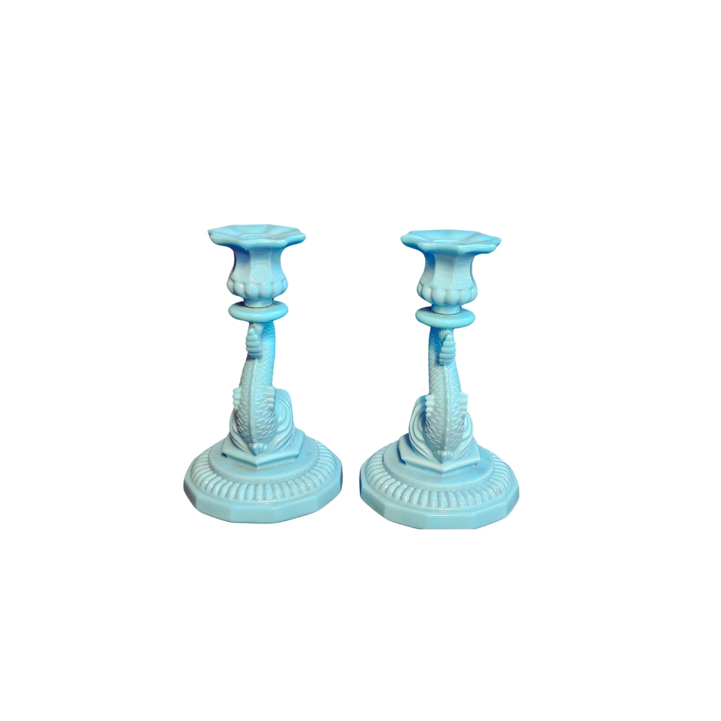 Get these groovy milk-colored candle holders in a set of two for only fifty bucks each! They'll add some serious retro vibes to your home decor.