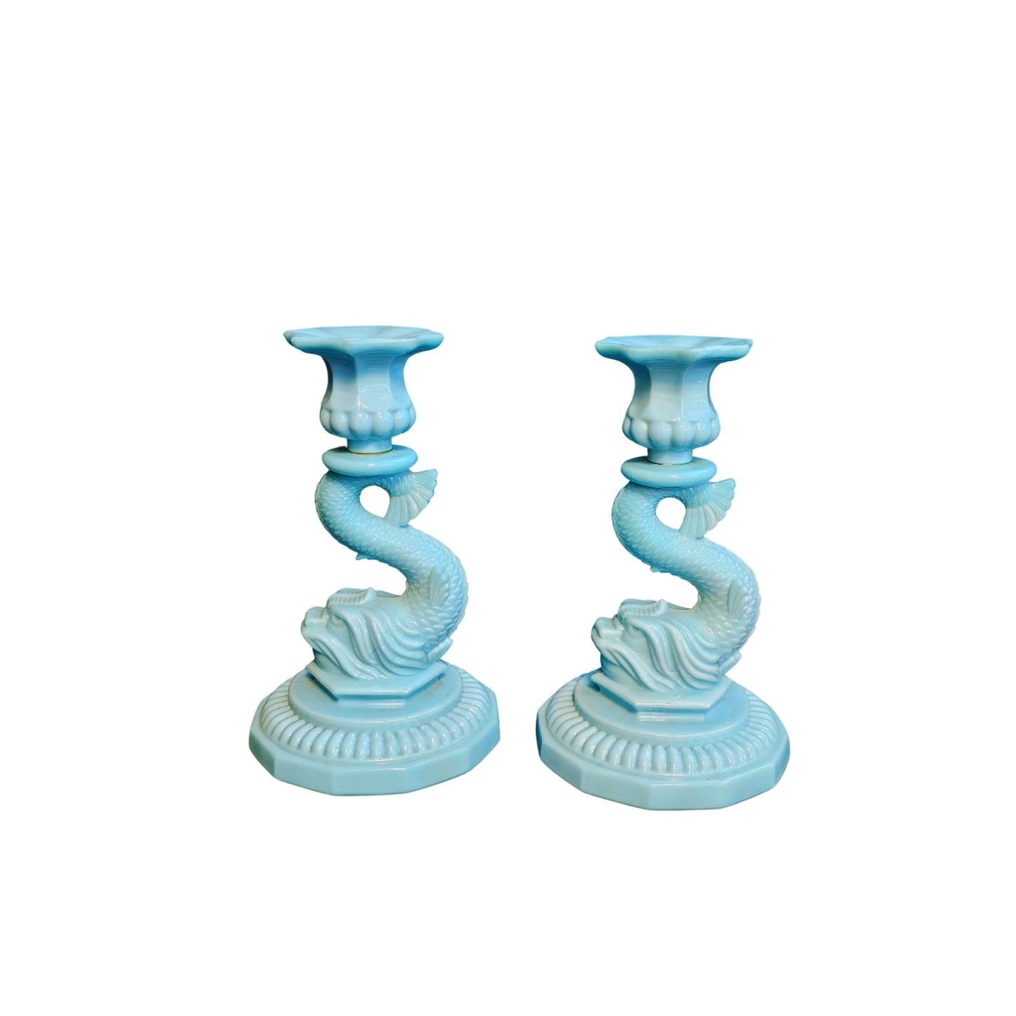 Get these groovy milk-colored candle holders in a set of two for only fifty bucks each! They'll add some serious retro vibes to your home decor.