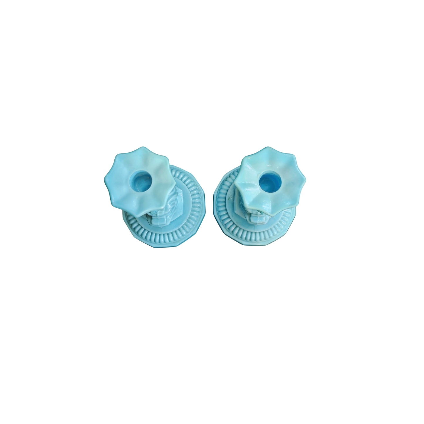 Get these groovy milk-colored candle holders in a set of two for only fifty bucks each! They'll add some serious retro vibes to your home decor.