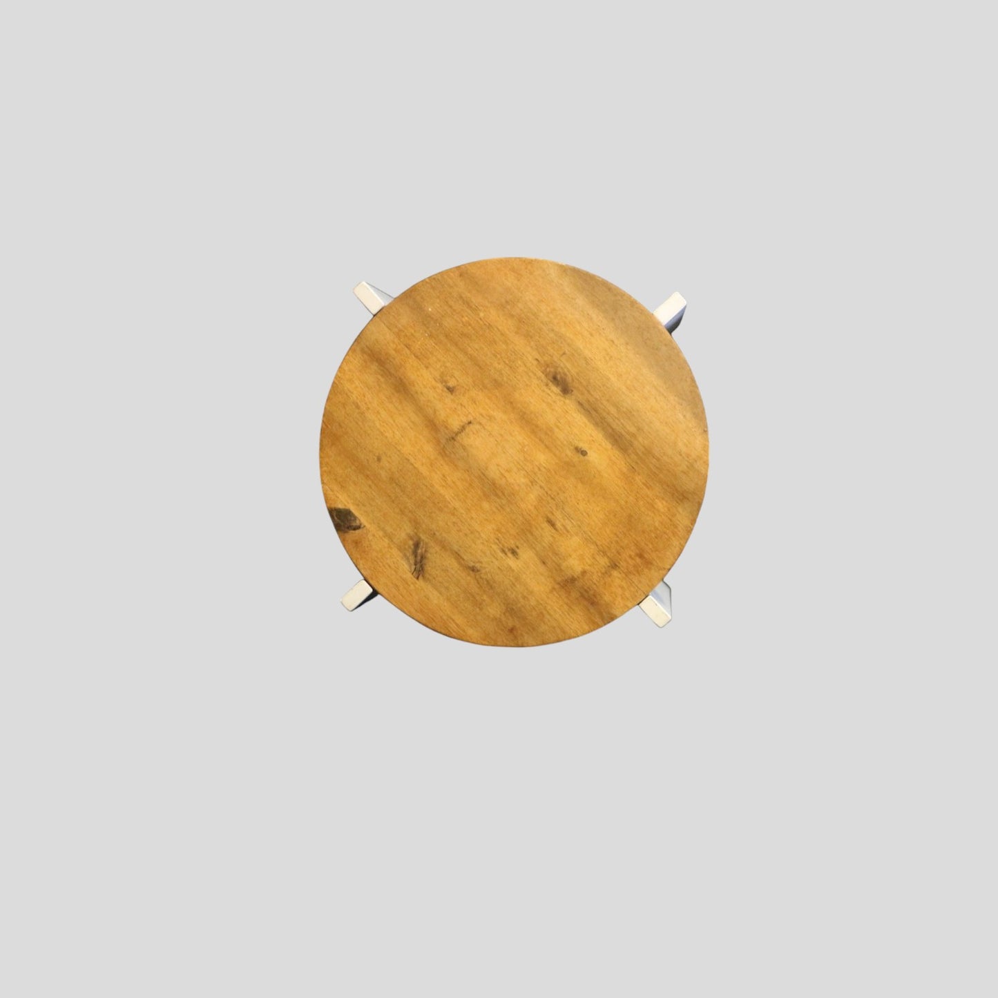 Retro 1970s round side table with iron legs and wood top.