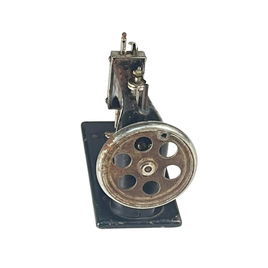 Right view of a vintage sewing machine on a white background