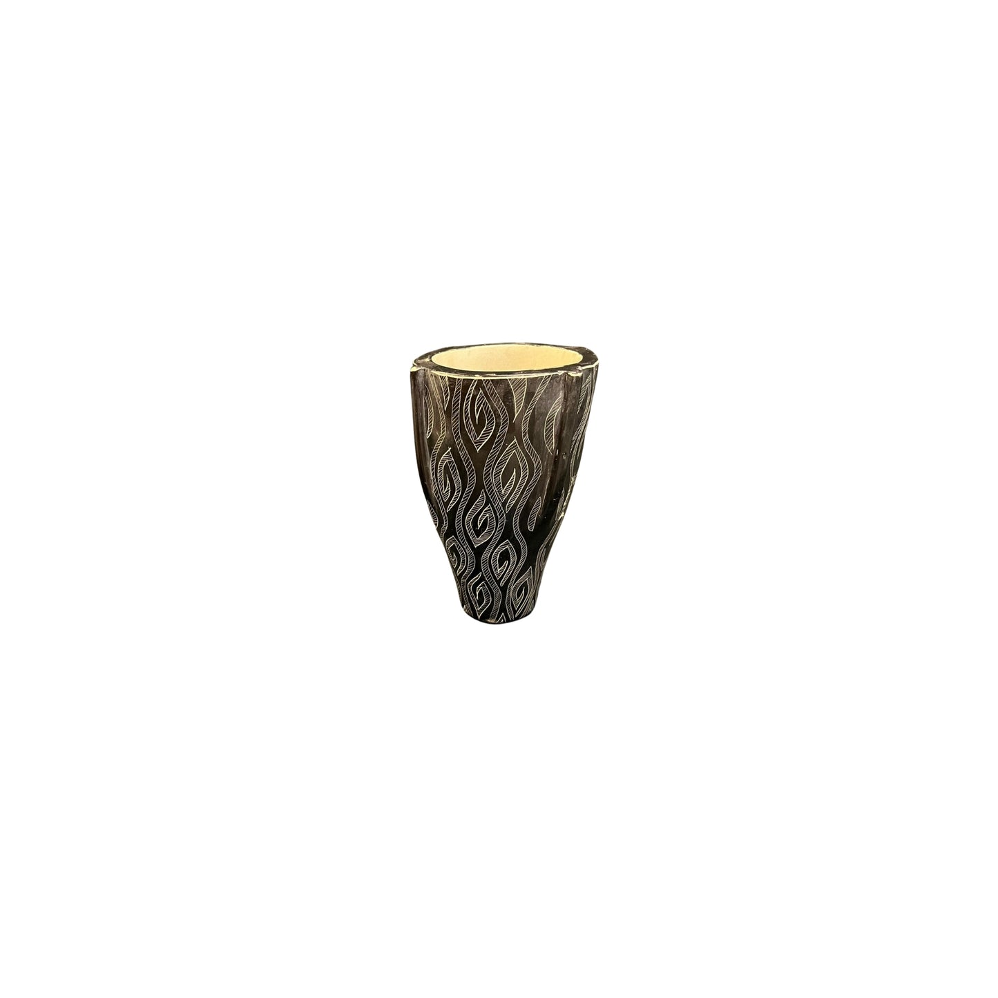 Immerse yourself in the rich culture and stunning beauty of Africa with this rare vase made of resin featuring indigenous designs. Versatile and solid, it can be used for flower arrangements or as a rustic and eclectic centerpiece that will add elegance to any decor.