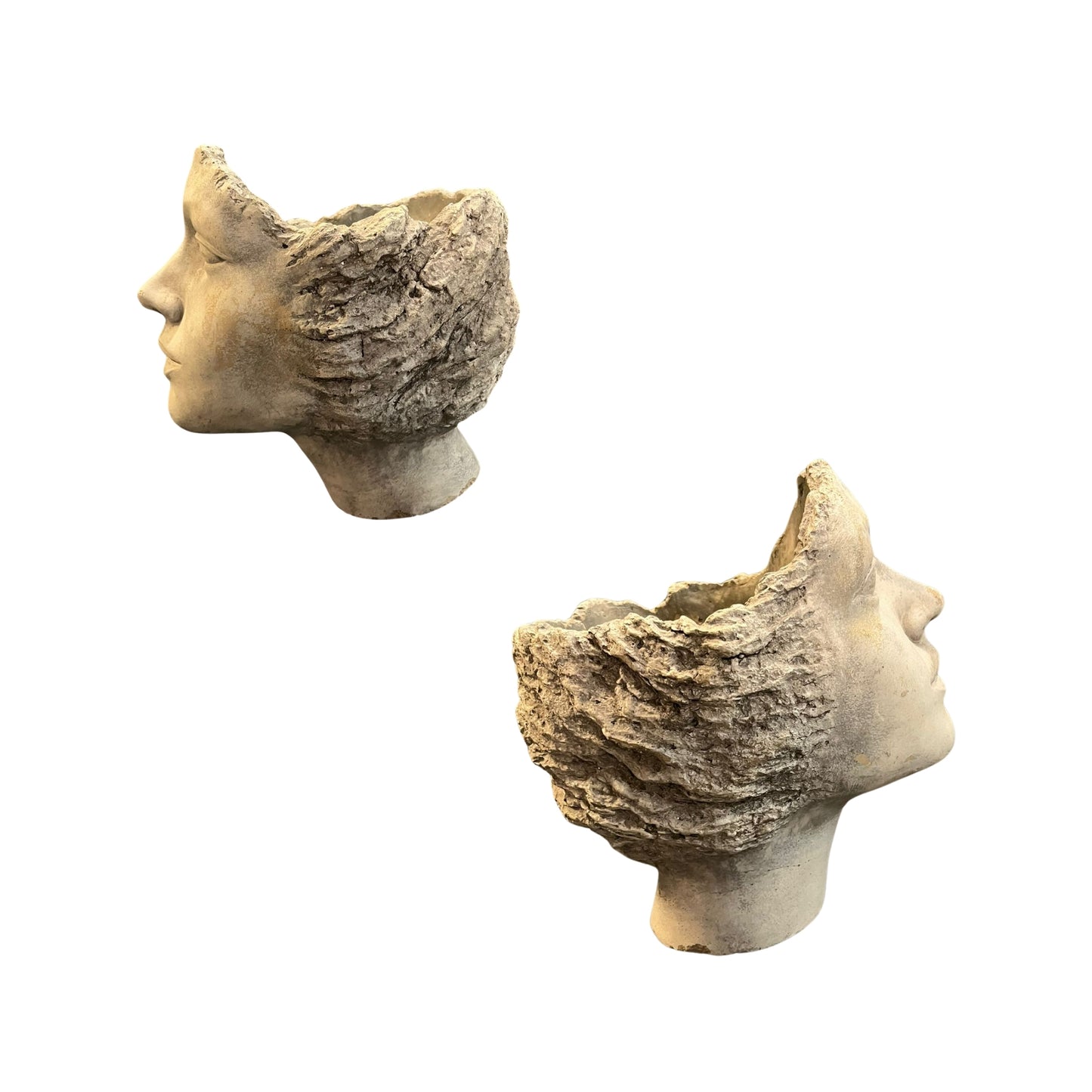 Add a touch of whimsy to your gardening with our Decorative Head Planter. Inspired by ancient Greek designs, this open back resin planter is perfect for showcasing flower arrangements or plants. (Warning: may cause fun and quirky conversations with your neighbors!)