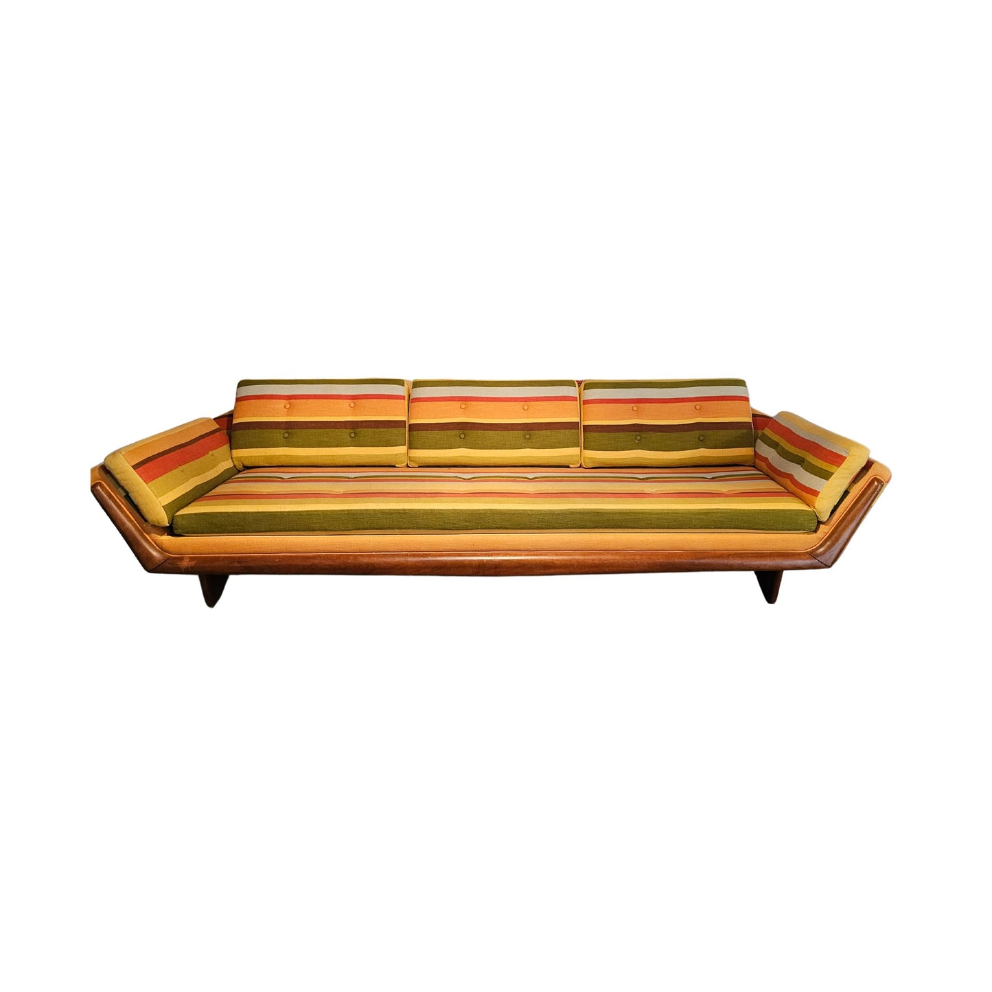 This amazing gondola sofa, crafted by Adrian Pearsall for Craft Associates, features a solid walnut frame and period tweed fabric. The front is adorned with solid walnut accents and the legs are sculpted from walnut. With its angled arms and customized side pillows, this sofa is perfect for reclining and relaxing.
