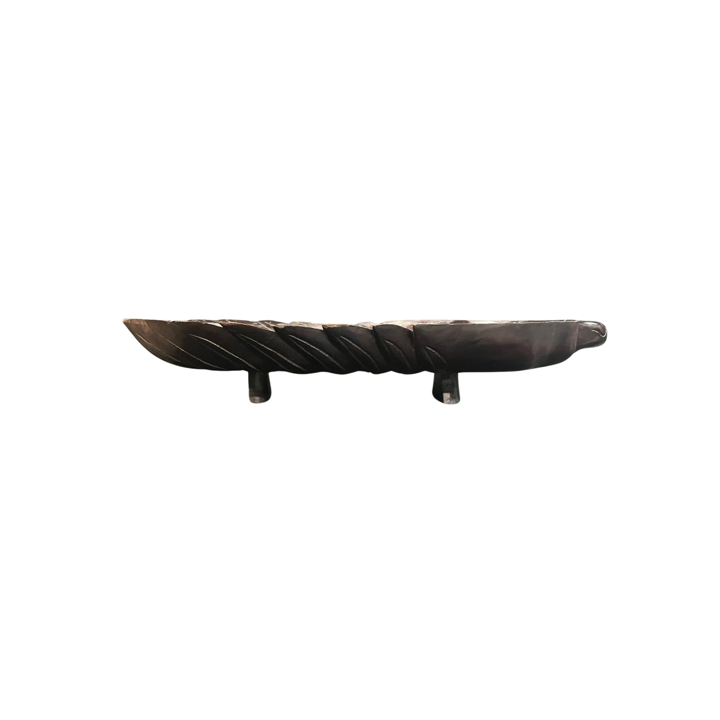 Take a risk and add an organic touch to your home decor with this Philodendron leaf wood carved tray. Made from earthy wood and carved to perfection, this tray is a bold and adventurous addition to any space. Spruce up your home with this unique and natural piece.
Beautifully wood-carved tray in leaf details and mahogany stained, a conversation centerpiece