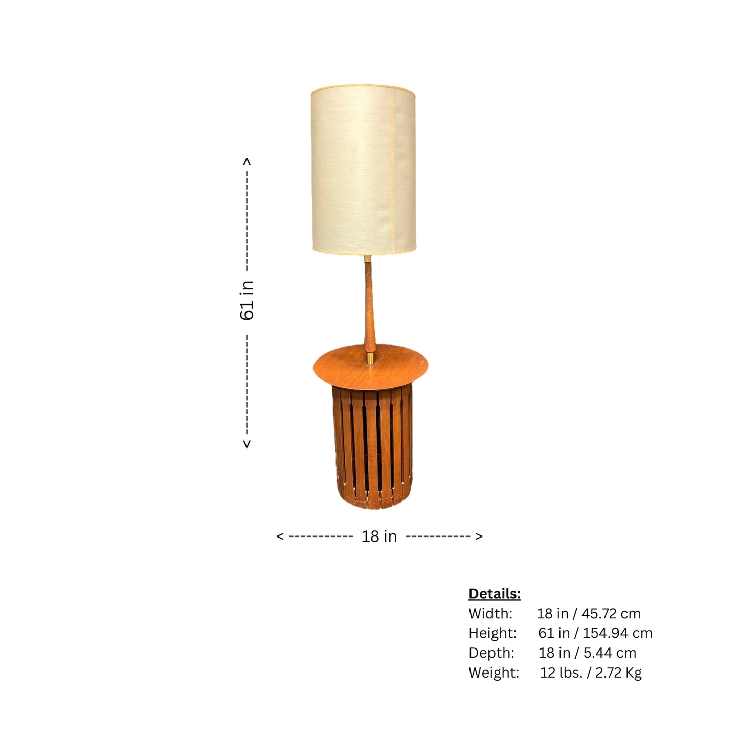 Mid Century Modern Wood Floor Lamp with table! Elevate your living space with this stylish and functional piece. Rare and hard to find, the sleek design features a built-in table perfect for holding books, drinks, or decorative items. With warm and inviting lighting, this lamp is sure to enhance any room.