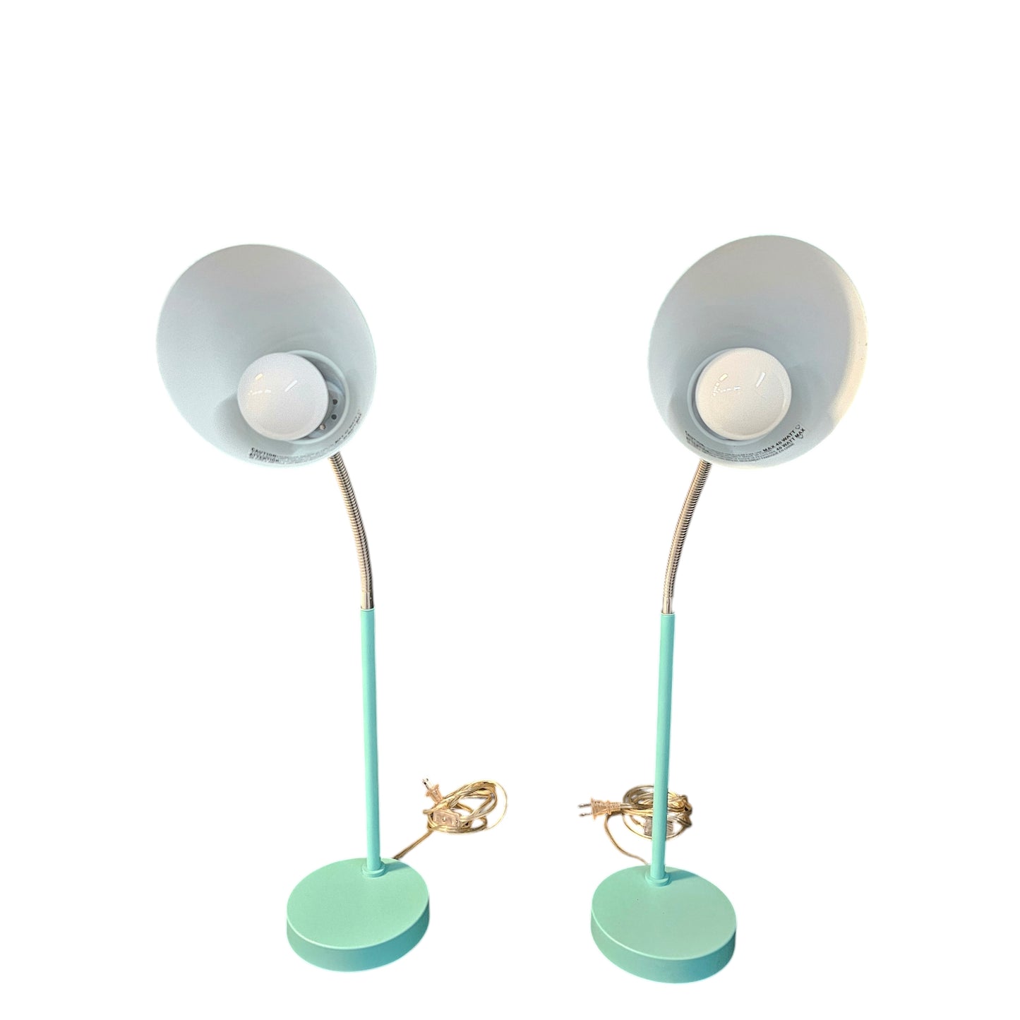 Unleash your inner risk-taker with the MCM Retro style able Lamps in Turquoise Teal, set of 2. These bold, vintage-inspired lamps add a touch of adventure to any room with their vibrant color and sleek design. Elevate your space and make a statement with these retro beauties. set of 2, $41.00 each