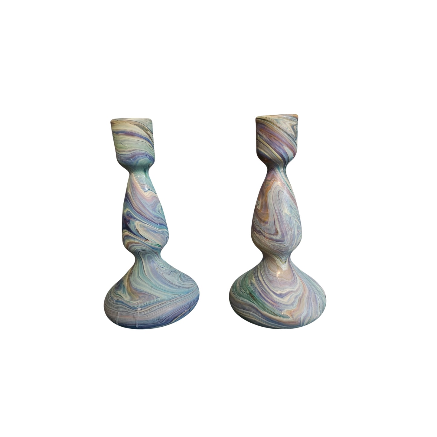 Experience the beauty and craftsmanship of our exquisite Blue Swirl Glass Candlestick Holder, inspired by the ancient Phoenician art of Hebron. Elevate your home decor with these rare pieces that are both visually stunning and functional as candle holders. A must-have for any art lover or avid collector.