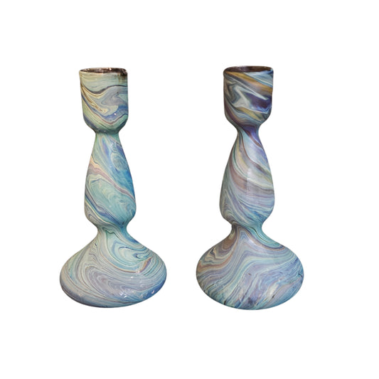 Two Glass candle holders on a white background