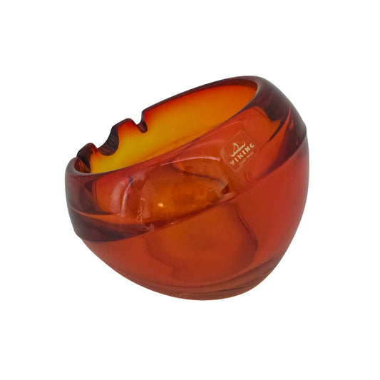 Side view of an orange glass ashtray with 'Viking' branding on a white background