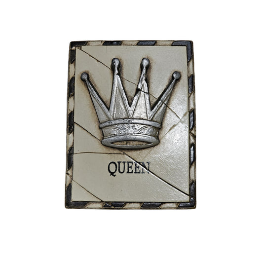 Decorative tile with a crown design and 'QUEEN' text on a white background