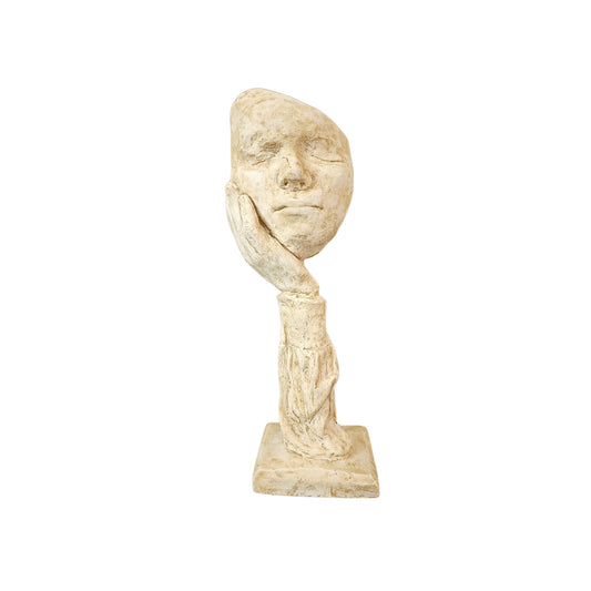 Decorative ceramic sculpture of a "Face Resting in Hands".