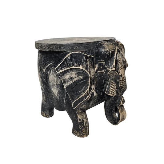 Behold the intricately hand-carved Wood Faded Black Elephant Footstool, complete with a dark brown wash!