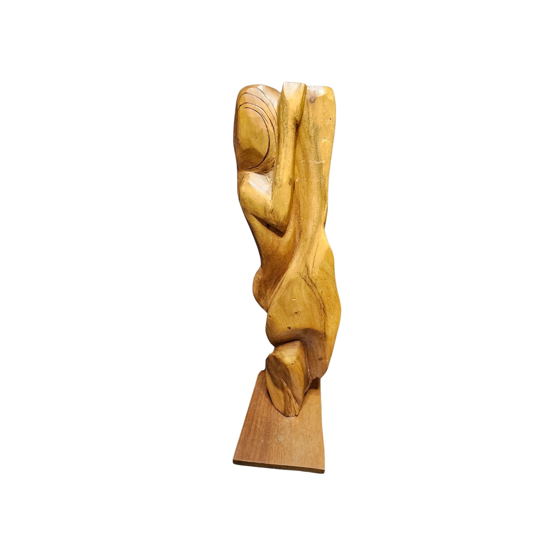 A stunning sculpture of a female figure hand-carved from precious wood in the midcentury style.
