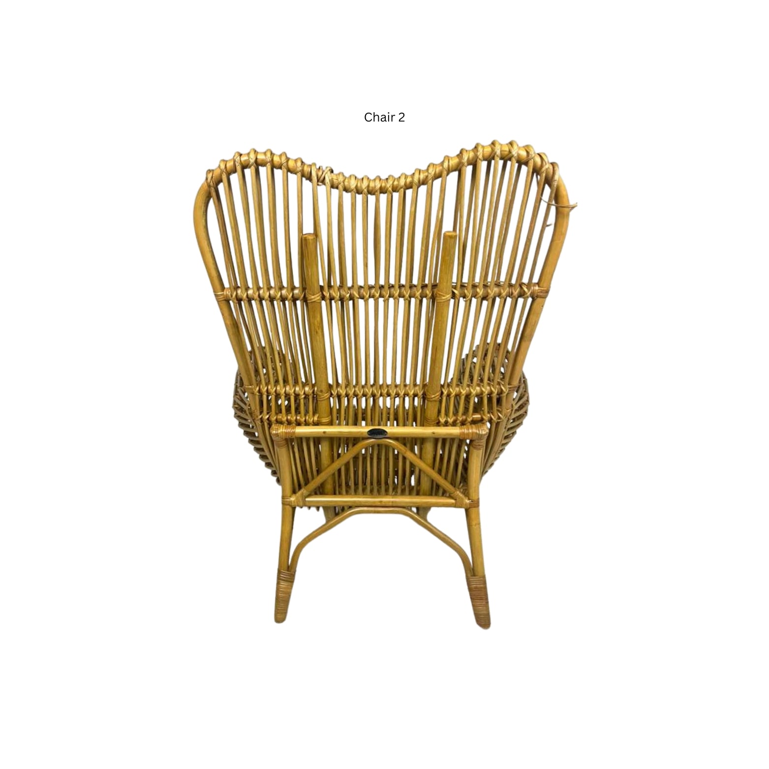 Back view of an Ibolili rattan chair with round backrest on white background