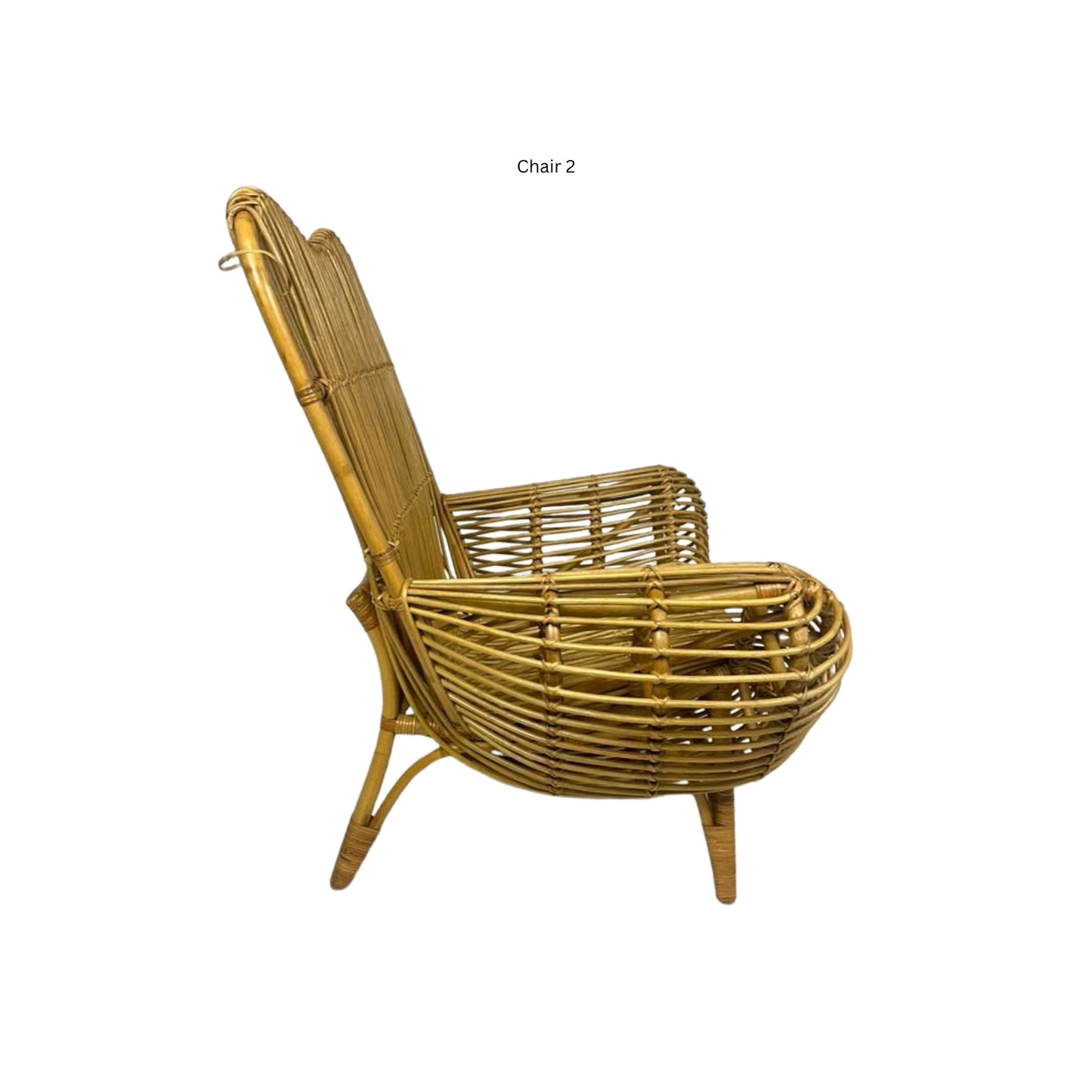 Side view of an Ibolili rattan chair with round backrest on white background