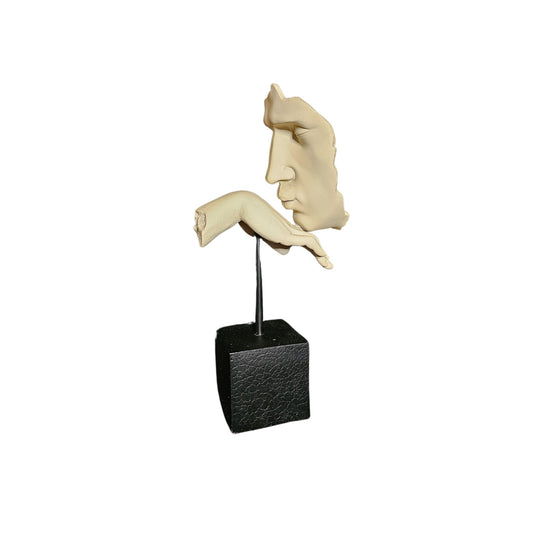 Kiss the sky with Vitruvian 'Blow a Kiss' sculpture on a block base.