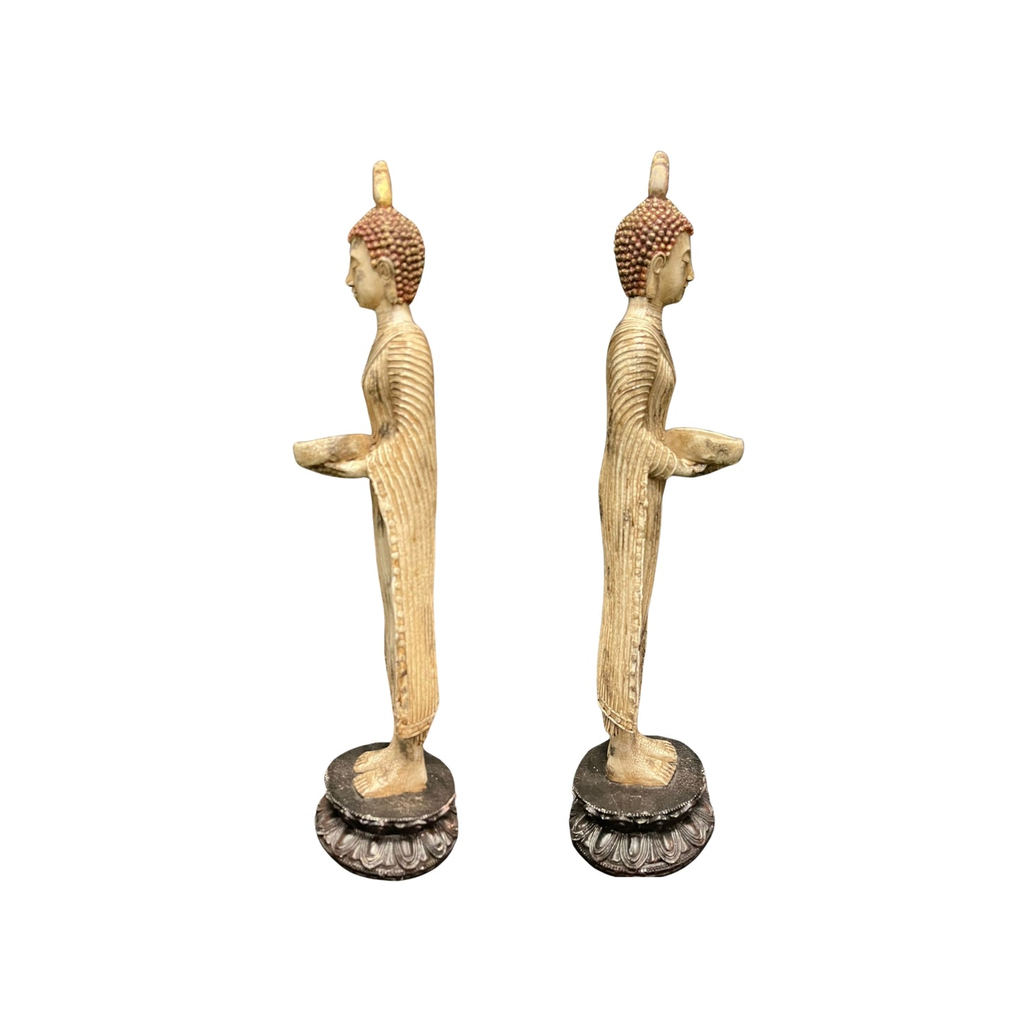 This vintage replica of a Standing Thai Buddha Statue is crafted with intricate details and a beautiful offering bowl, this statue is perfect for creating a peaceful and serene atmosphere with a touch of ancient Buddhist traditions into your space and promote relaxation and mindfulness.