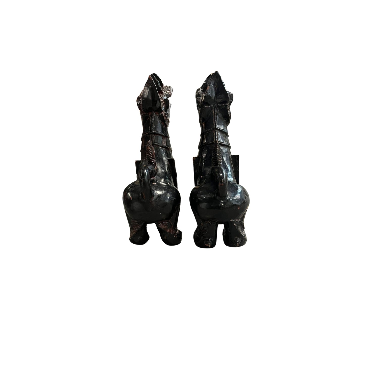 With these antique Chinese wood carved Foo Dogs by your side, you'll never have to worry about evil spirits again! According to Chinese culture, these mythical lions are powerful protectors that bring a sense of safety and peace to your home. Their intricate carvings and sturdy construction only add to their value and beauty. Let these legendary creatures guard your space with their unwavering strength and presence 
