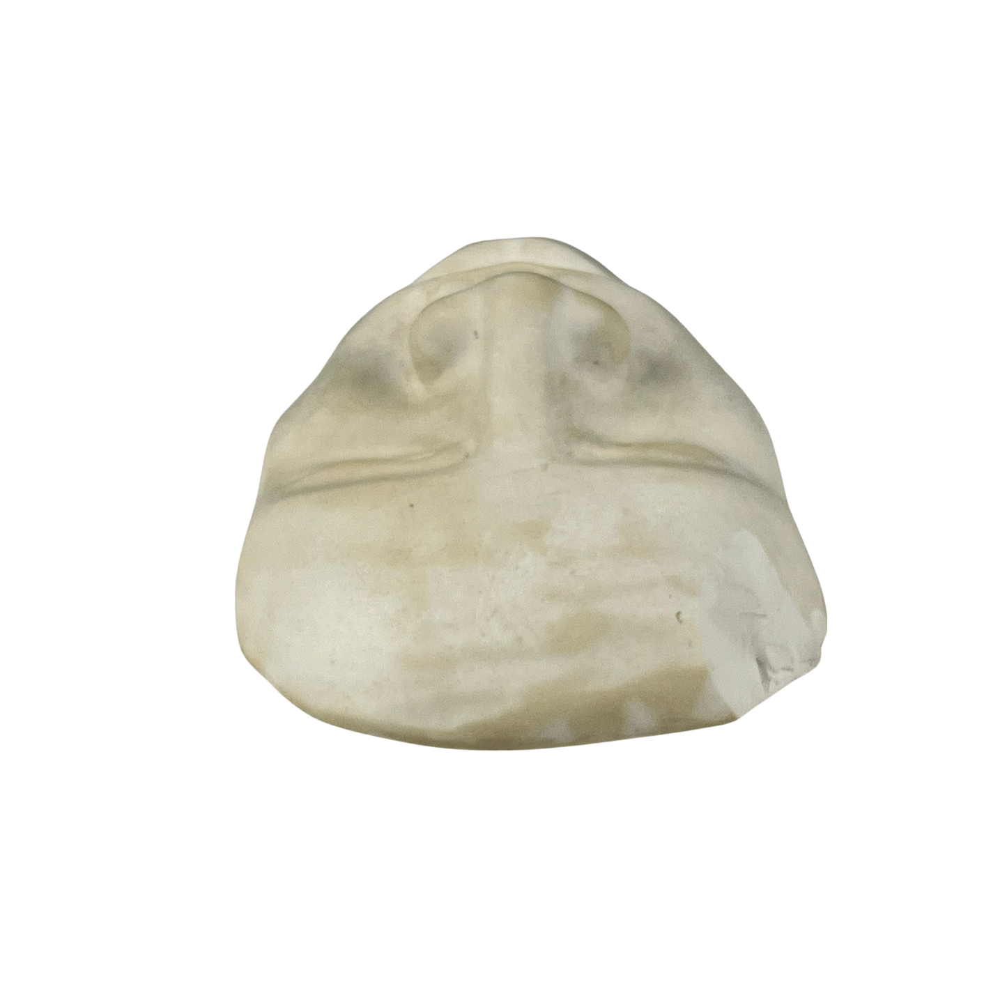Top view of a plaster sculpture of a face on a white background