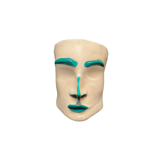 Experience the allure of the Mid Century with our Ceramic Face Sculpture featuring unique captivating green accents. This sophisticated piece evokes the elegance and beauty of the era, adding a touch of chic luxury to any space. Elevate your home decor with this unique and timeless work of art.

Ceramic face sculpture with green features
