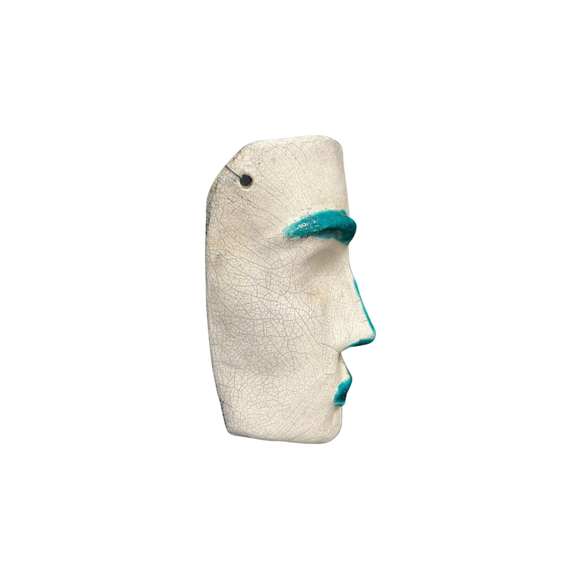 Experience the allure of the Mid Century with our Ceramic Face Sculpture featuring unique captivating green accents. This sophisticated piece evokes the elegance and beauty of the era, adding a touch of chic luxury to any space. Elevate your home decor with this unique and timeless work of art.

Ceramic face sculpture with green features