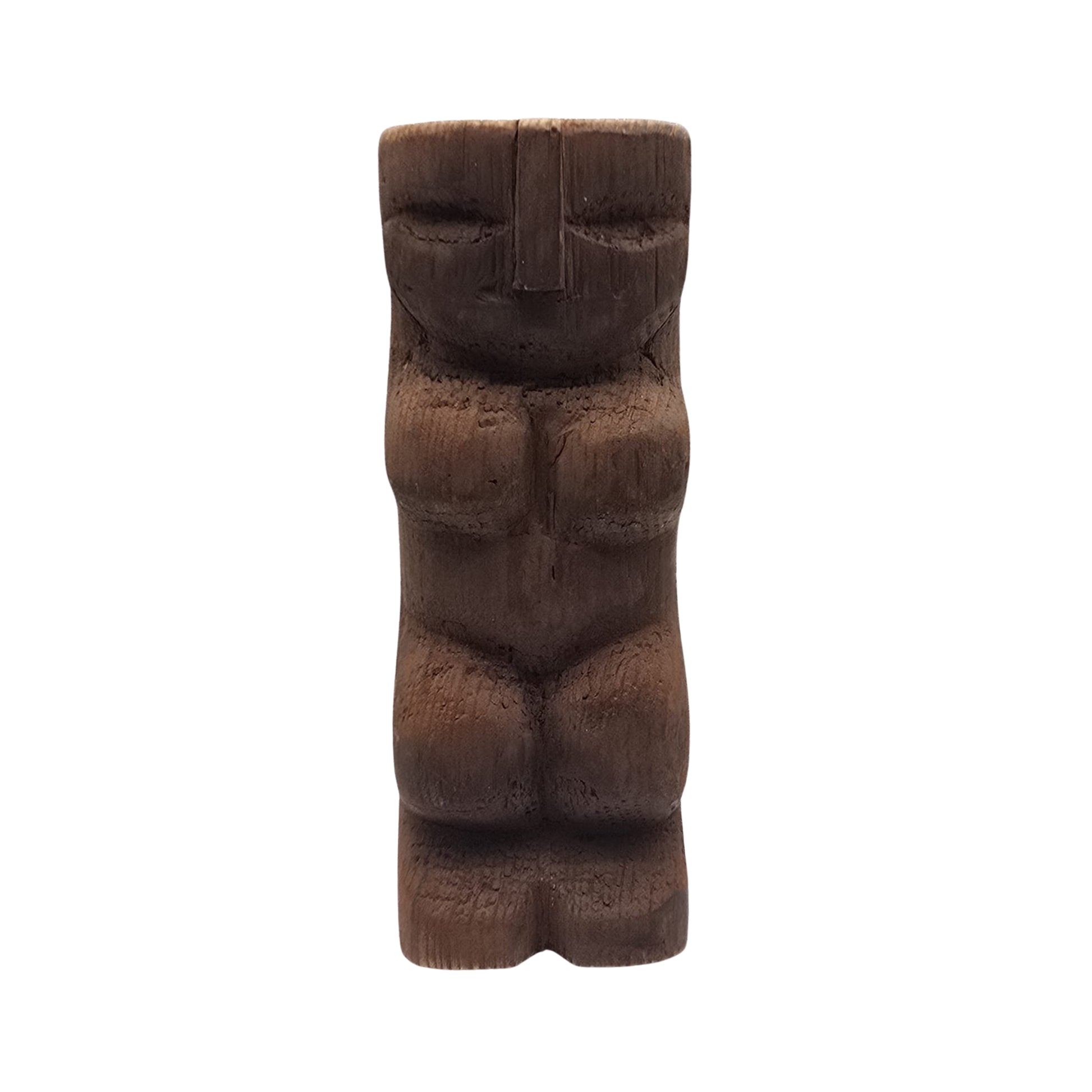Carved wooden Hawaiian tiki sculpture on a white background