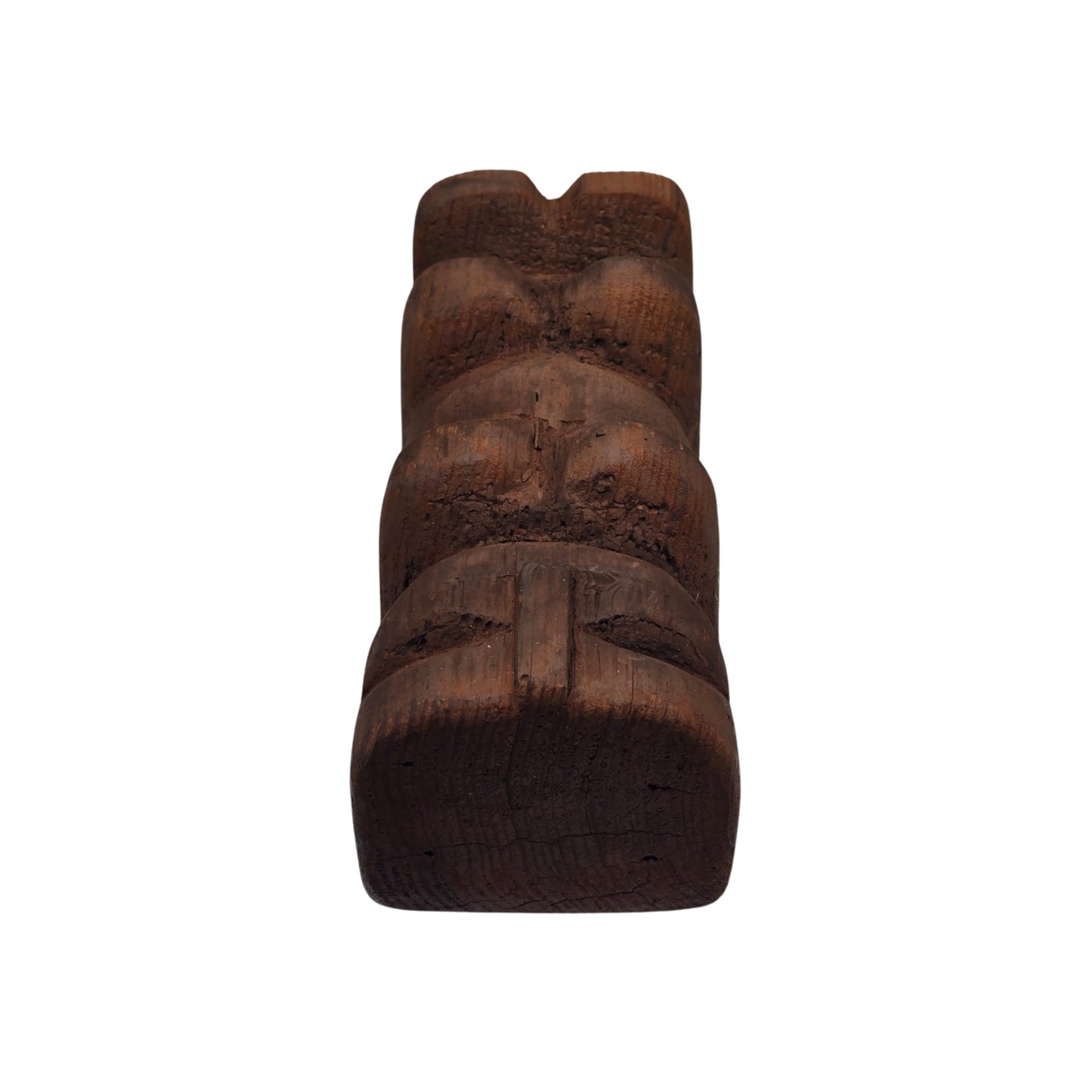 Top view of a Hawaiian wooden tiki sculpture on a white background