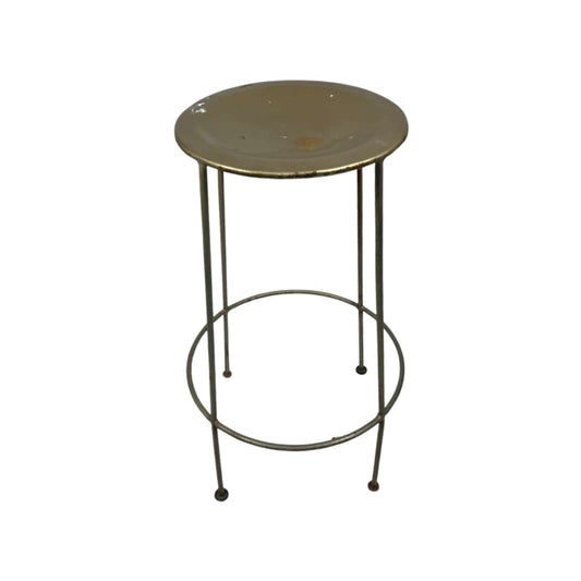 Front view of a metal stool with a round top on a white background