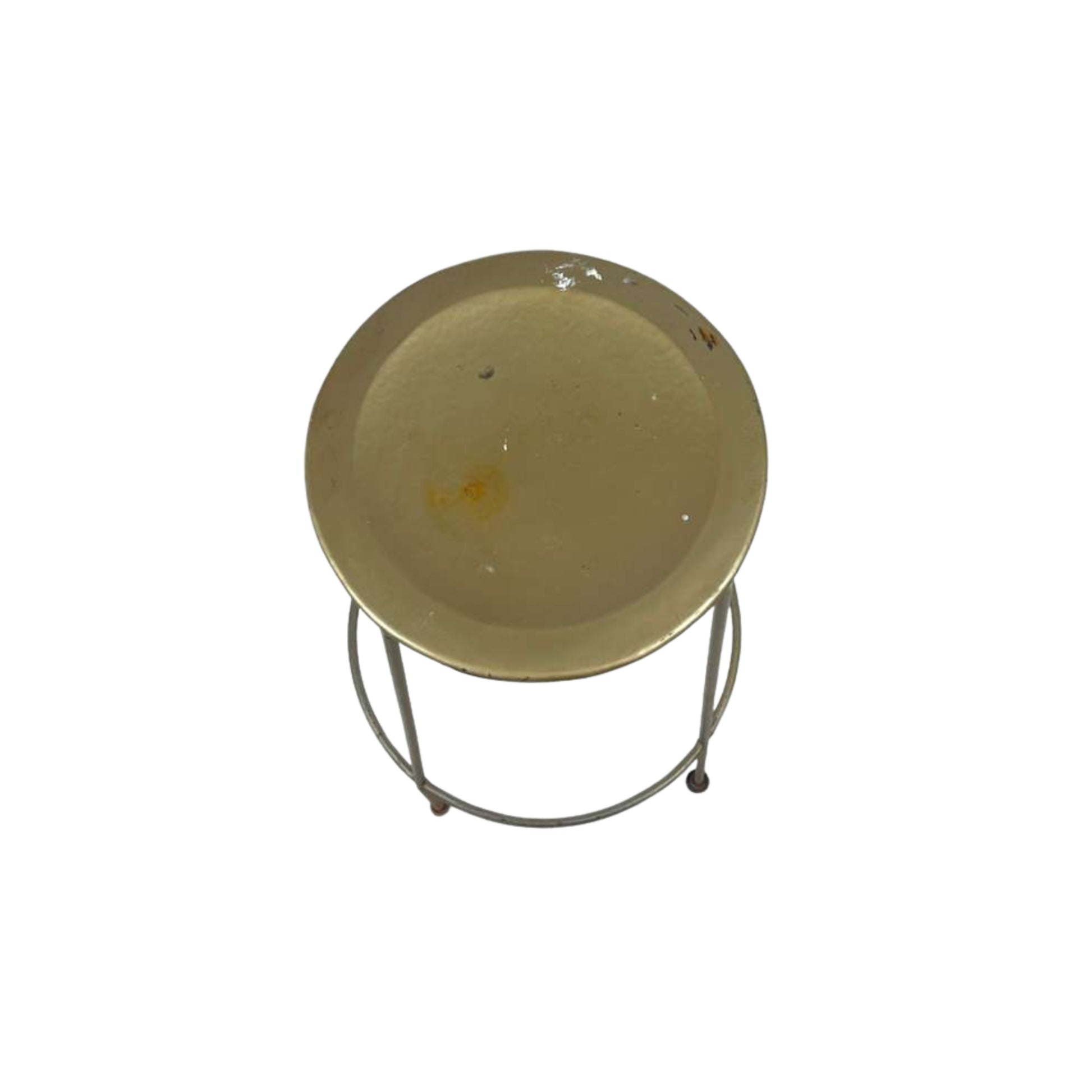 Top view of a metal stool with a round top on a white background