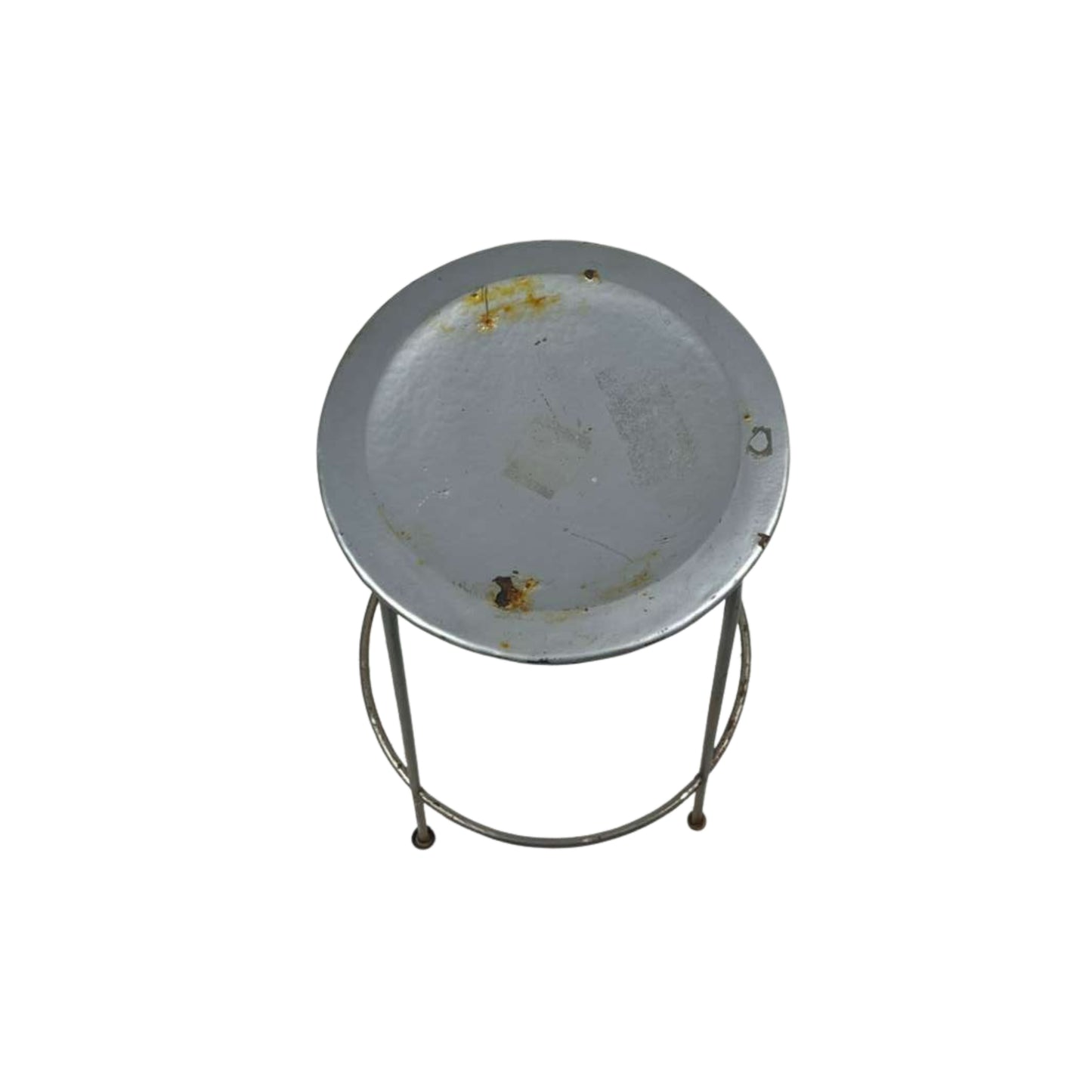 Top view of a metal stool with a round top on a white background