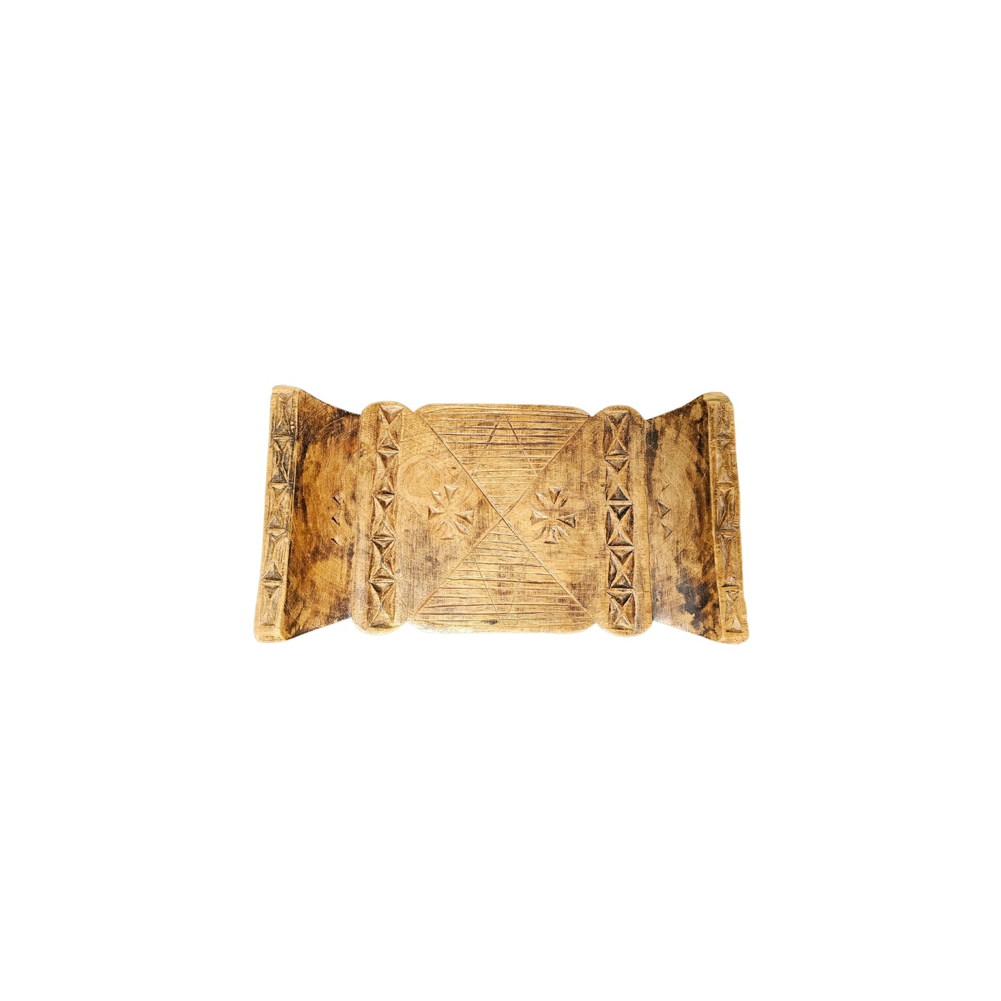 Take a trip back in time with our Vintage Carved Wood Ashanti Stool. This unique piece was crafted in Ghana during the 1950s era and showcases the rich history and culture of the African Ashanti tribe. Every groove and curve on this stool tells a story, making it a perfect addition to any home looking to embrace adventure and take a risk with their decor. Transport your space to a whole new level of boldness and style with this one-of-a-kind piece!