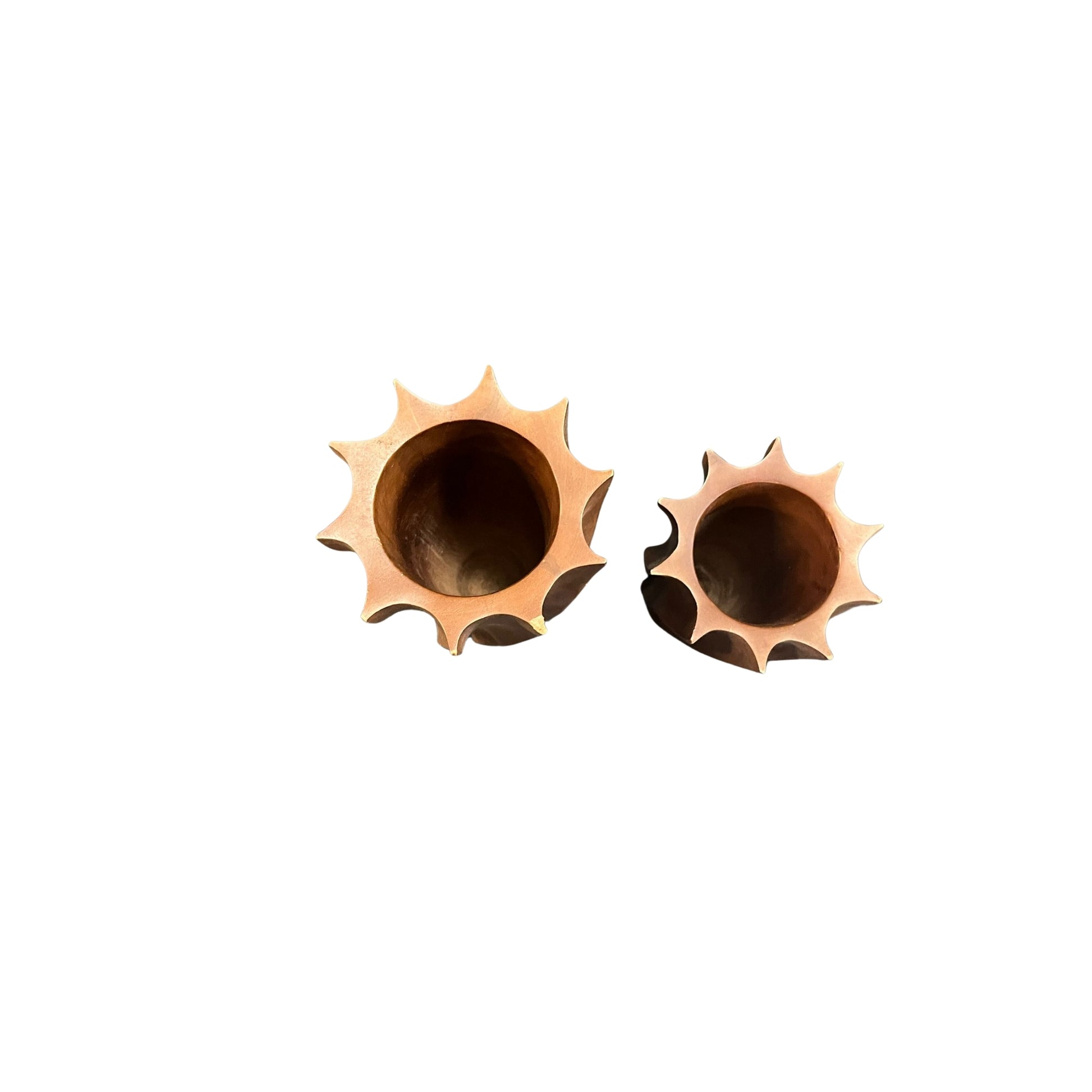 Indulge in the beauty and charm of these MCM embossed teak wood vases, accented with vertical waves for a rustic touch. Experience the sense of tranquility and warmth that these vases bring to your living space., set of 2, $45.00 each