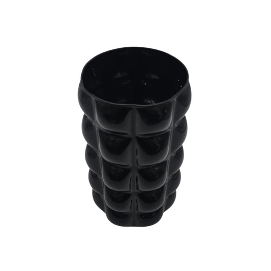 Black textured decorative cylindrical vase on a white background