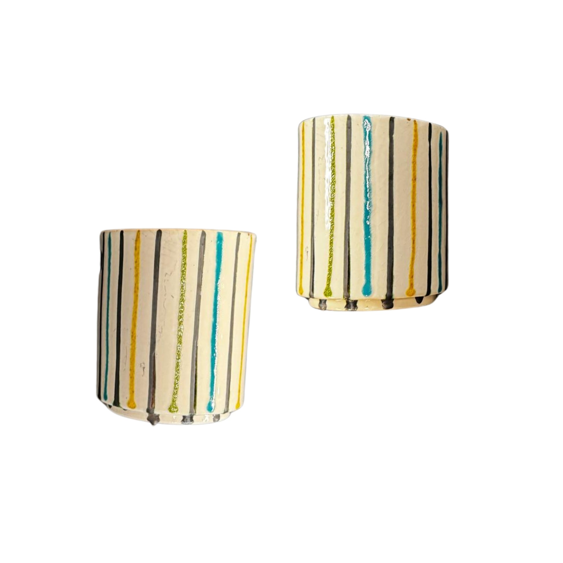 This elegant Pottery Vase, crafted in Portugal, features vibrant vertical stripes and a glossy glaze finish, evoking the sophistication of Mid-Century Modern design.