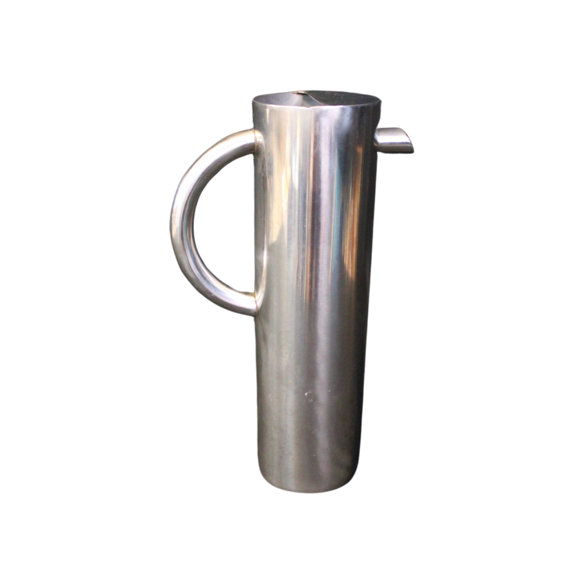 Side view stainless steel pitcher on a white background