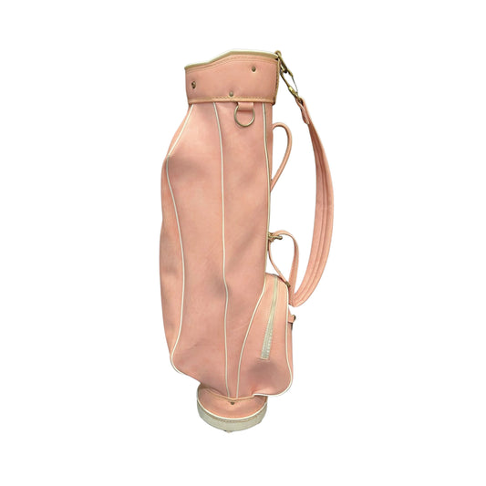 Pink golf bag with a strap on a white background