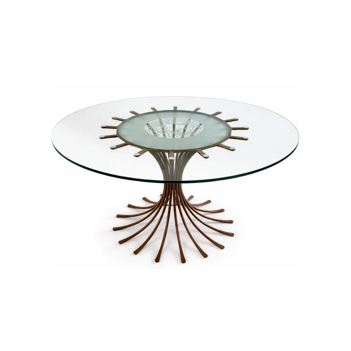 View of a table composed of a hammered iron pedestal and a carved glass top on a white background