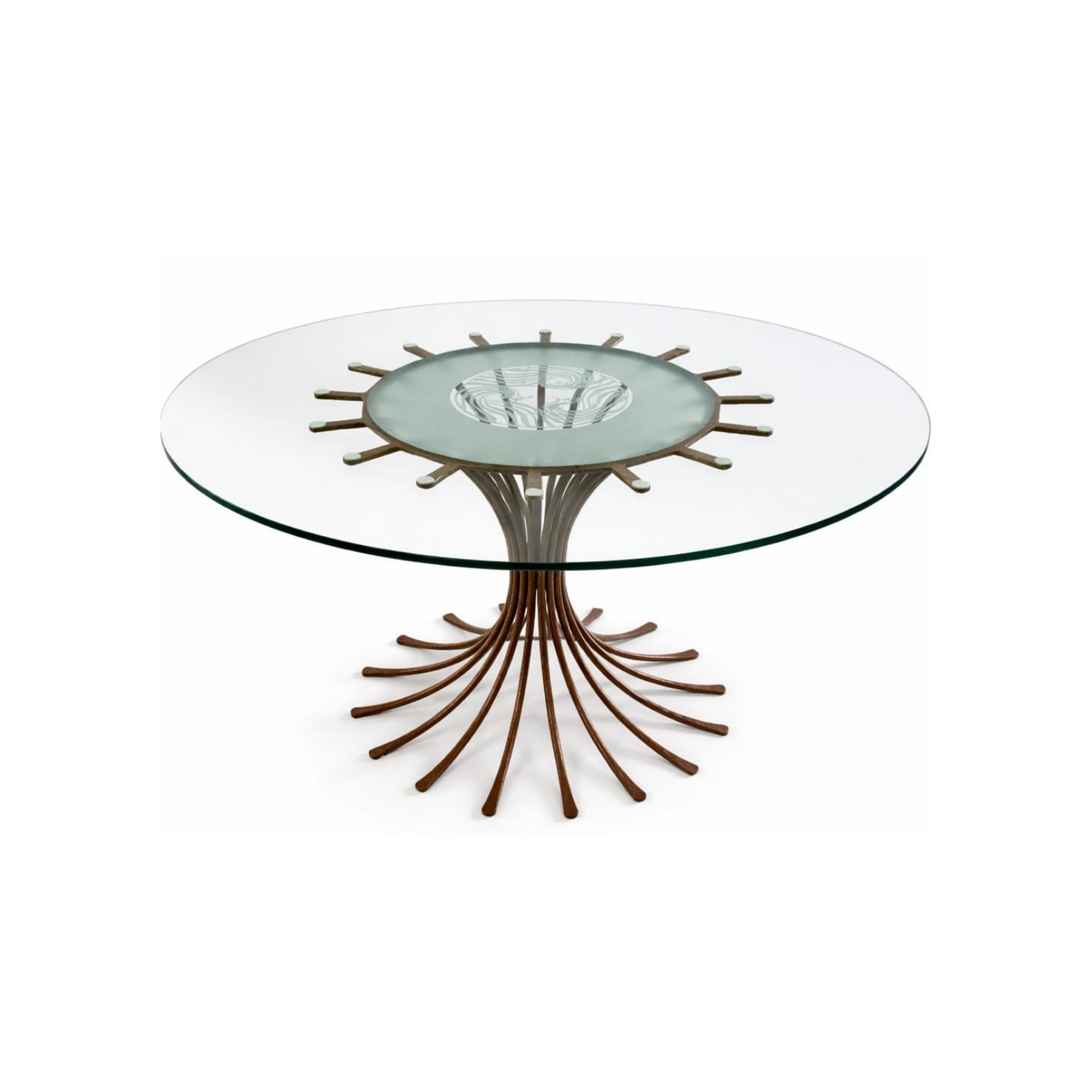 View of a table composed of a hammered iron pedestal and a carved glass top on a white background