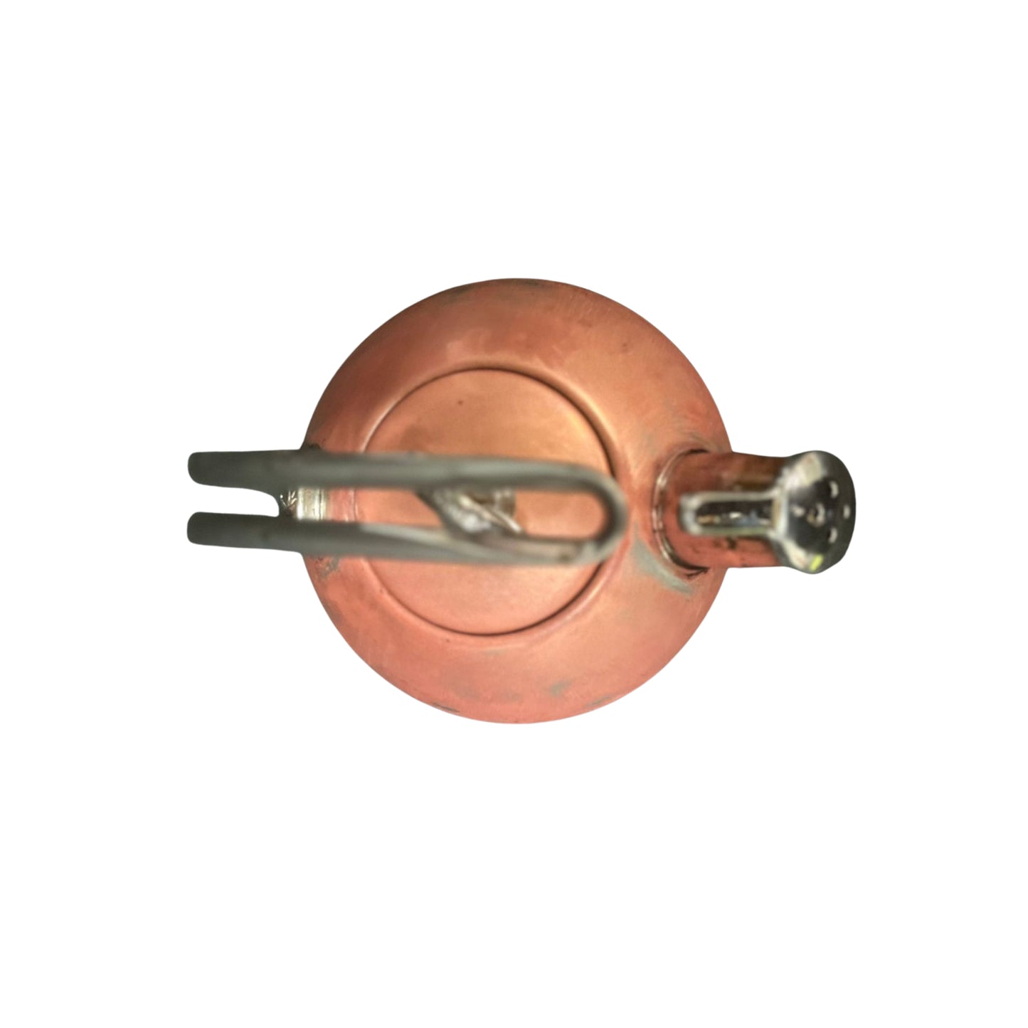 Top view of a copper kettle with a silver handle and spout on a white background