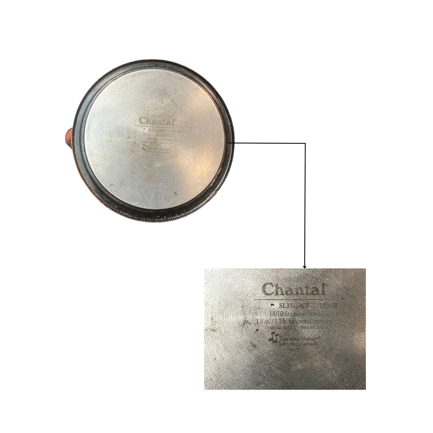 View from the bottom of a copper kettle with a handle and spout of silver on a white background