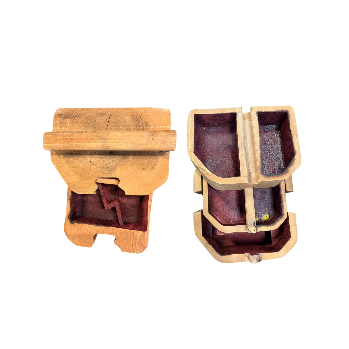 Top view of the inner part of a wooden jewelry box, which comes apart like a puzzle, in a rustic style