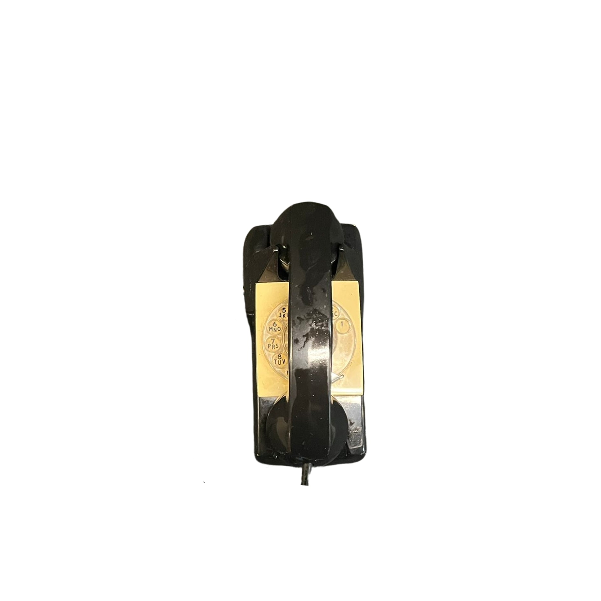 "Get ready to dial back to the past with this funky Vintage MCM Wall Rotary Phone in sleek black. It's a total conversation starter (pun intended), guaranteed to make your friends green with phone envy. Time to get your old school swag on!"